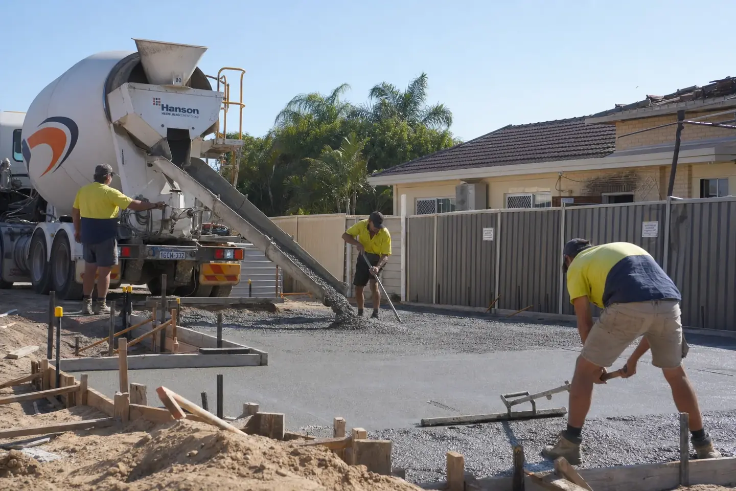 Concrete pour in progress on a Perth residential site with formwork